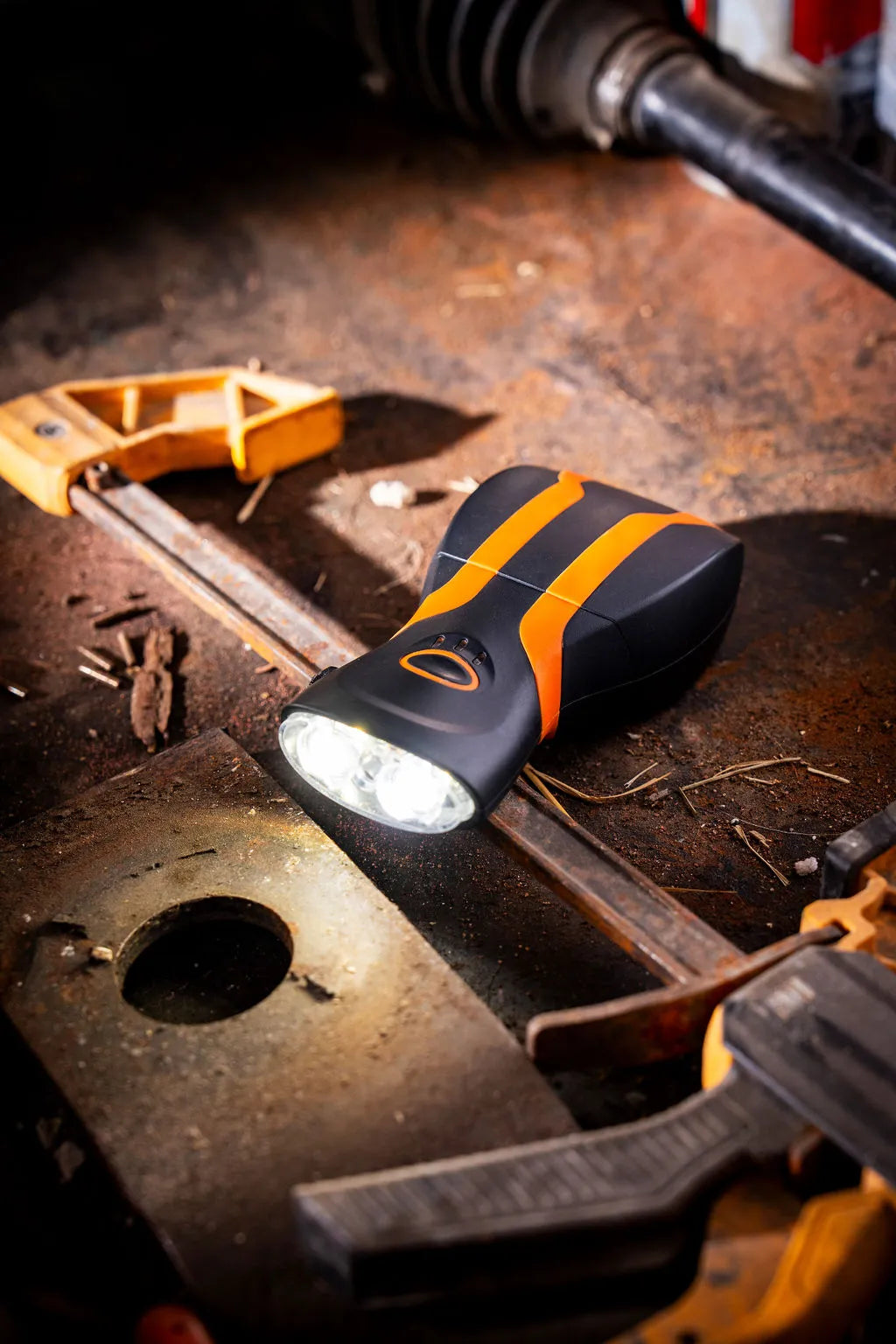 durable illumibite hands-free flashlight illuminating a workbench in a demanding task environment